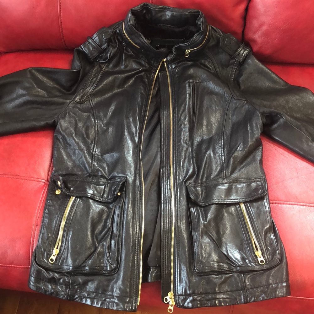 Women’s leather biker jacket. Size medium.